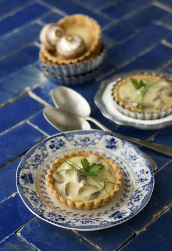 Entrante gourmet: Tartaletas de champiñón al gratén.